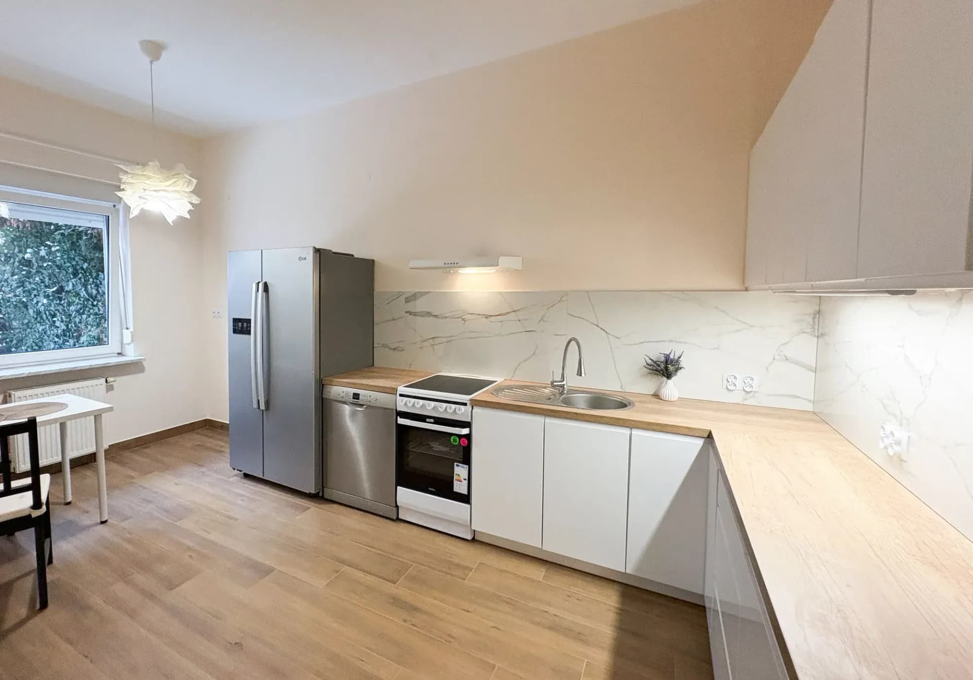 Mieszkanie 59 m² z ogródkiem 40 m² i miejscem garażowym - zdjęcie 2
