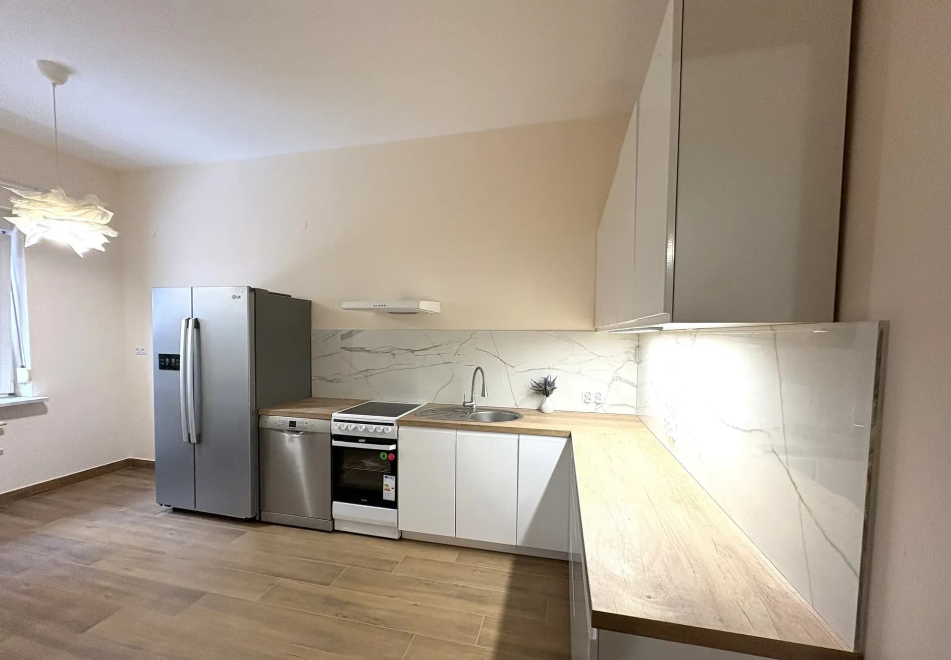 Mieszkanie 59 m² z ogródkiem 40 m² i miejscem garażowym - zdjęcie 3
